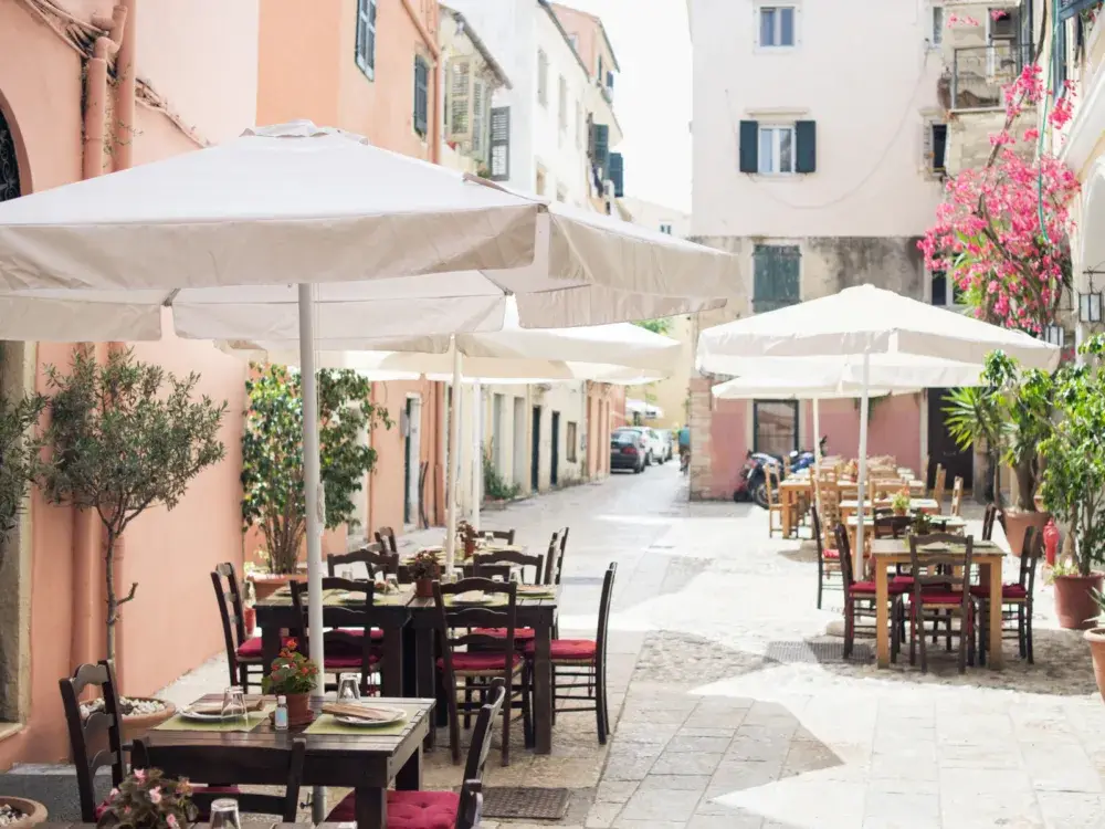 Cool and quaint outside tables in Corfu, one of the best things to do in Greece
