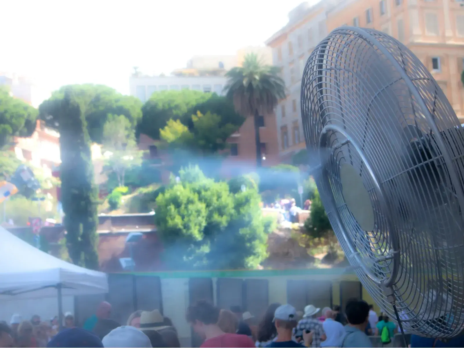 A misting fan pictured on a hot day during the worst time to visit Rome
