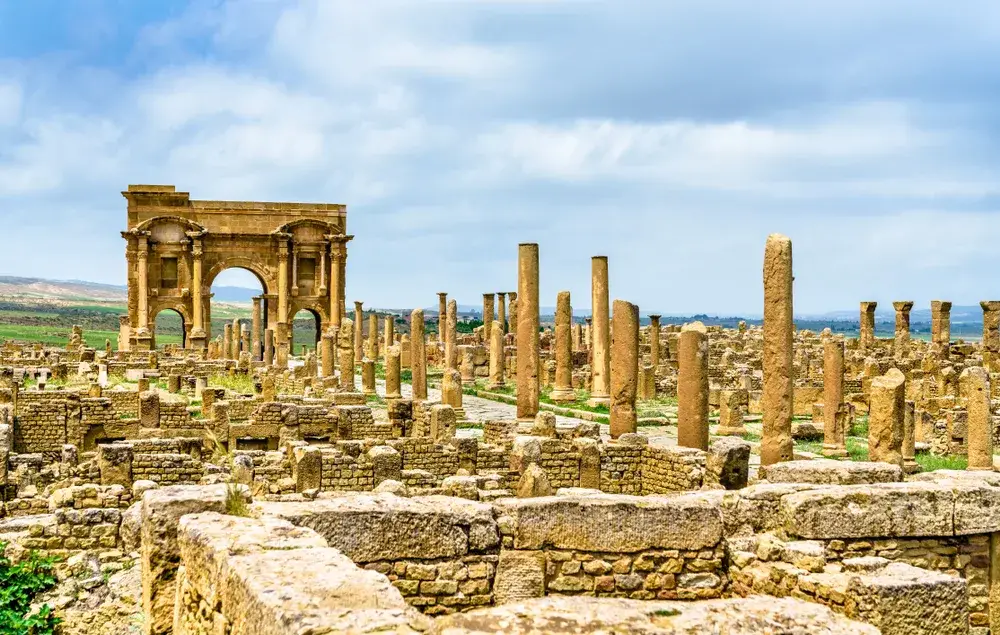 Roman ruins called Timgad in Algeria on a nice day during the best time to visit Algeria