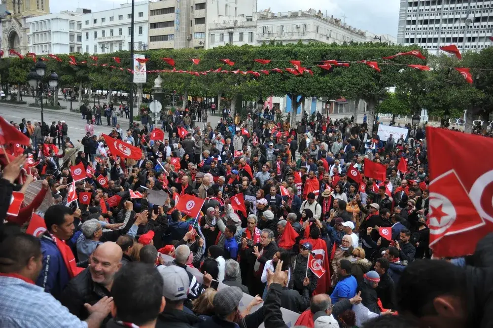 Thousands of protesters in Tunis protesting for a piece titled Is Tunisia Safe to Visit