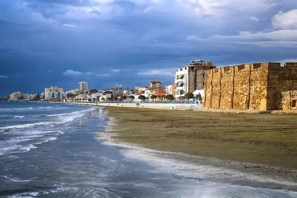 Rain above the medieval castle of Larnaca during the worst time to visit Cyprus