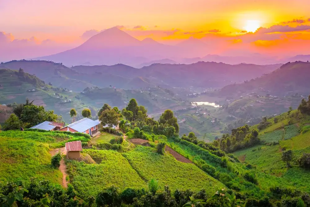 View of Kisoro at sunrise showing hills and mountains for a piece on Is Uganda Safe