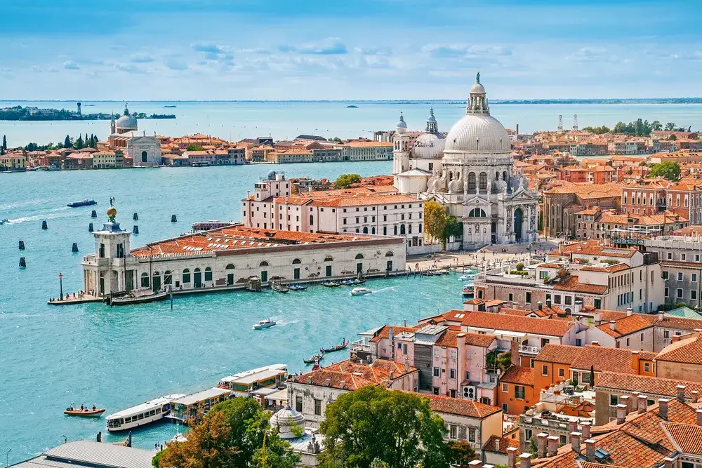 Aerial view of Venice skyline showing the Maria della Salute church for a piece on the best time to visit Venice