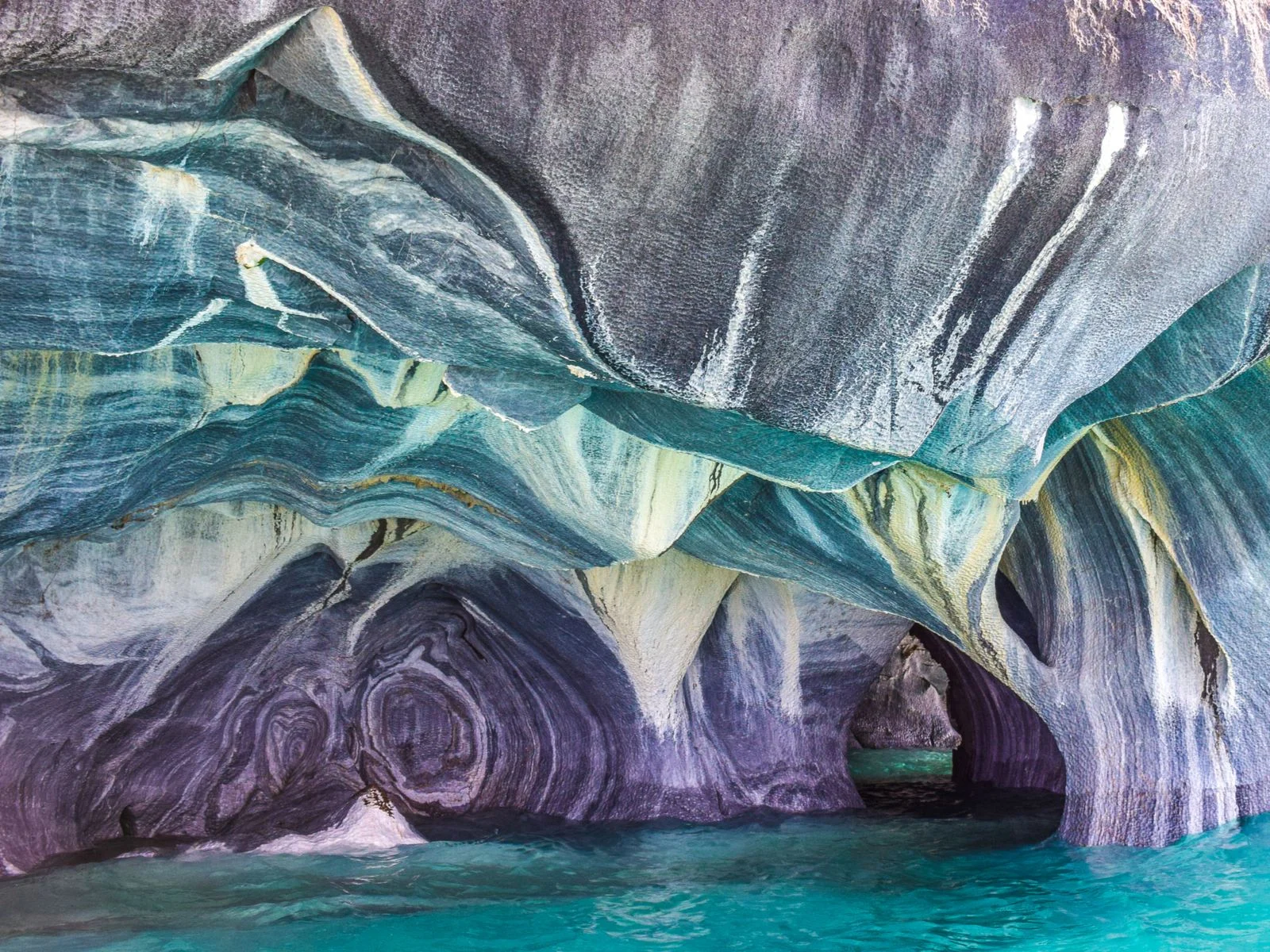 To highlight the best time to visit Chile, The blue colors of the marble caves in patagonia