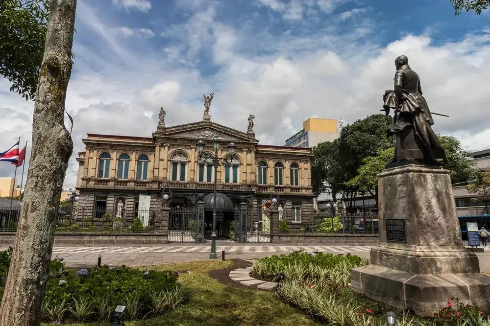 Classic architecture in the Costa Rican city of San Jose pictured with the National Theatre Building in full view of the camera