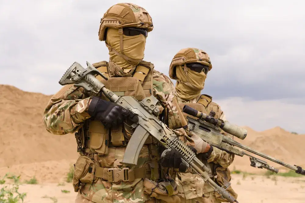 Two special forces soldiers close-up, military anti-terrorism operations concept to illustrate that Afghanistan is unsafe to visit
